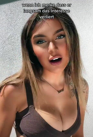 Sexy Gwendolyn Celine Shows Cleavage in Brown Crop Top