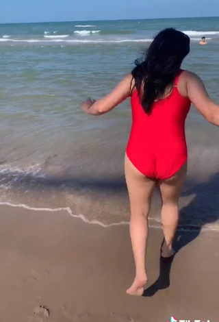 Sultry Heer Naik in Red Swimsuit at the Beach