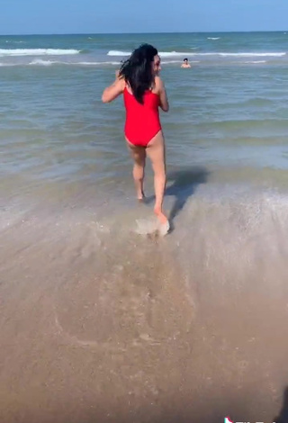 5. Sultry Heer Naik in Red Swimsuit at the Beach