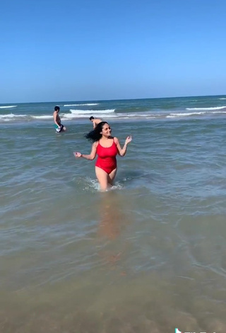 7. Sultry Heer Naik in Red Swimsuit at the Beach