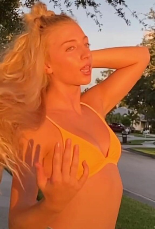 1. Sexy Hannah Mae Dugmore Shows Cleavage in Orange Bikini Top