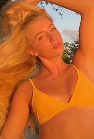 Sexy Hannah Mae Dugmore Shows Cleavage in Orange Bikini Top