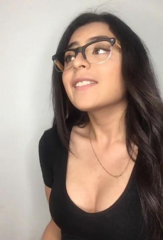 Sultry Brenda Vazquez Shows Cleavage in Black Top