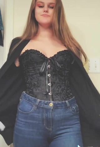 3. Sultry Dakota Young in Black Corset