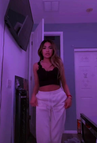 1. Sultry Emily in Black Crop Top