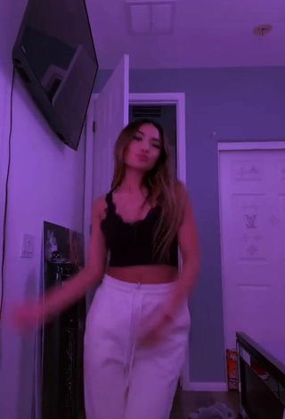 4. Sultry Emily in Black Crop Top