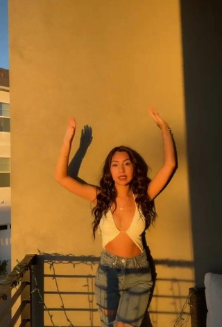 Sultry Jazlyn G in White Bodysuit on the Balcony