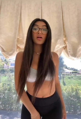 Luscious Jackie Ybarra Shows Cleavage in Grey Sport Bra