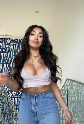 2. Luscious Jackie Ybarra Shows Cleavage in Grey Top