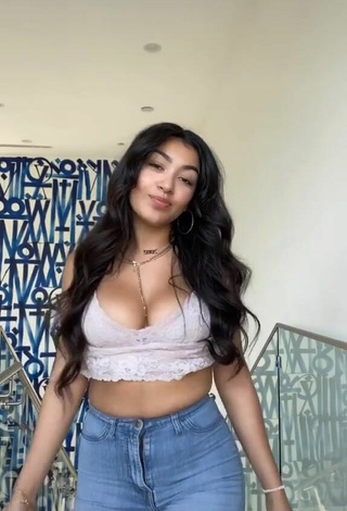 4. Luscious Jackie Ybarra Shows Cleavage in Grey Top