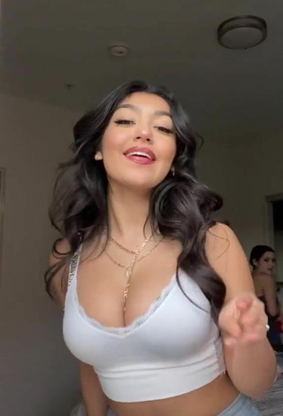 Gorgeous Jackie Ybarra Shows Cleavage in Alluring White Crop Top