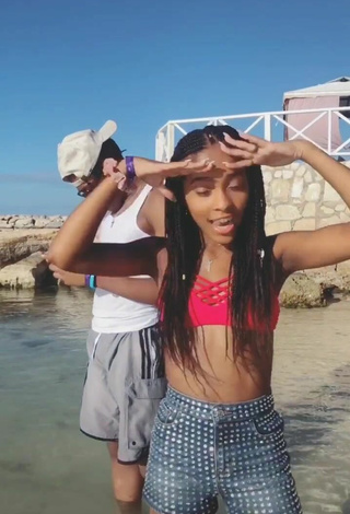 Sultry Jada Wesley in Red Bikini Top at the Beach