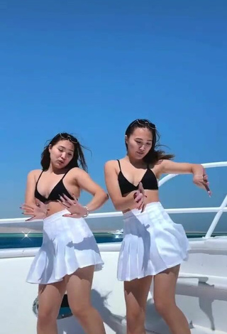 4. Sultry Tomiris & Nargiz Kanatova in Black Bikini Top on a Boat