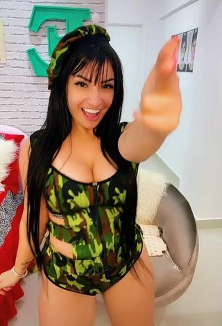 4. Sultry Emanuelly Raquel Shows Cleavage in Camouflage Swimsuit and Bouncing Boobs