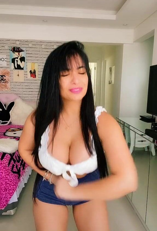 5. Luscious Emanuelly Raquel Shows Cleavage in White Crop Top and Bouncing Boobs