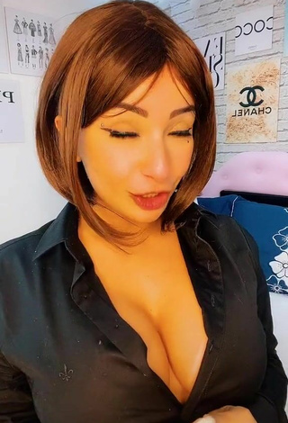 Sultry Emanuelly Raquel Shows Cleavage and Bouncing Boobs