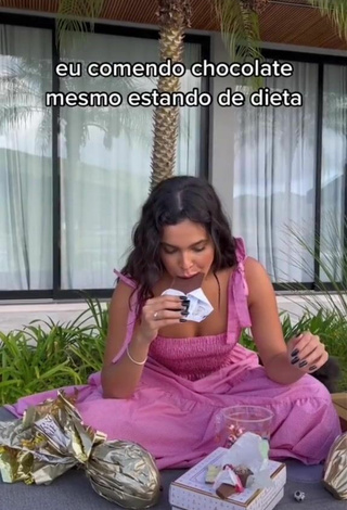 Sultry Emilly Araújo Shows Cleavage in Pink Crop Top