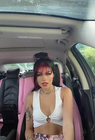 6. Titillating Emo.fio in White Crop Top in a Car while Twerking