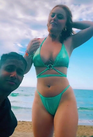 6. Sultry Giorgia Cavalluzzo Shows Cleavage in Green Bikini at the Beach