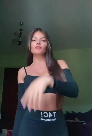 Sexy Grisela Shows Cleavage in Black Crop Top