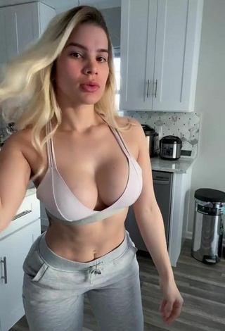 Hot Yuri Shows Cleavage in Grey Sport Bra