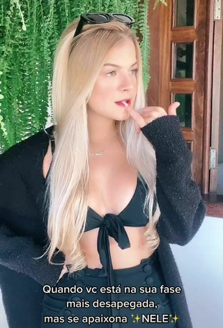 Sultry Jade Sales Shows Cleavage in Black Crop Top