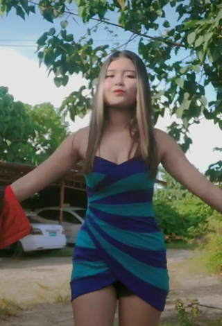 6. Sultry Jemary Kyla Toling in Striped Dress