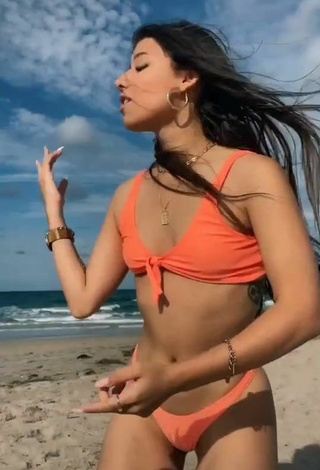 6. Beautiful Jesca Jimenez in Sexy Orange Bikini at the Beach