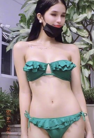 3. Luscious Jing Alvarez Shows Cleavage in Green Bikini