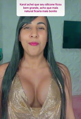 3. Titillating Karollyny Campos Shows Cleavage in Golden Crop Top while Twerking