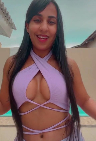 Luscious Karollyny Campos Shows Cleavage in Purple Crop Top