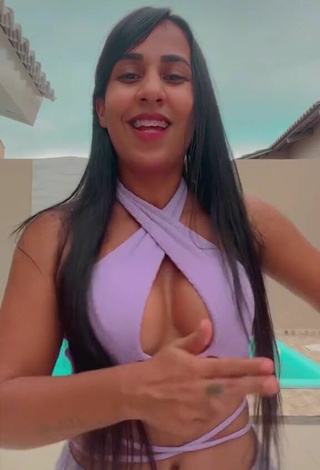 2. Luscious Karollyny Campos Shows Cleavage in Purple Crop Top