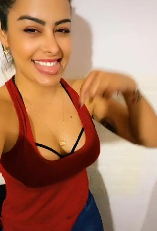 Luscious Larissa Riquelme Shows Cleavage in Red Top