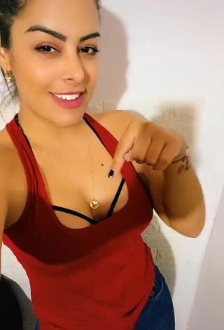 4. Luscious Larissa Riquelme Shows Cleavage in Red Top