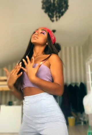 2. Sultry Elizabeth Anorue in Purple Tube Top and Bouncing Boobs