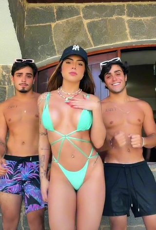 Alluring Luana Targinno Shows Cleavage in Erotic Green Bikini