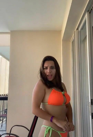 3. Sultry Lydia Rodriguez in Orange Bikini