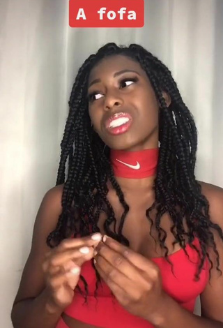 Titillating MC Soffia Shows Cleavage in Red Crop Top