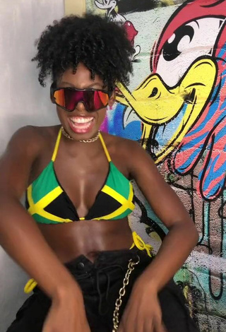 2. Titillating MC Soffia Shows Cleavage in Bikini Top