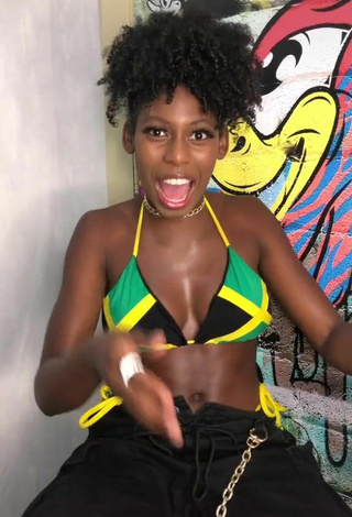 3. Titillating MC Soffia Shows Cleavage in Bikini Top