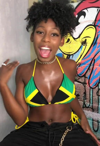 4. Titillating MC Soffia Shows Cleavage in Bikini Top