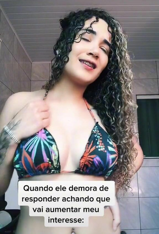 Titillating Michele Monteiro Shows Cleavage in Floral Bikini