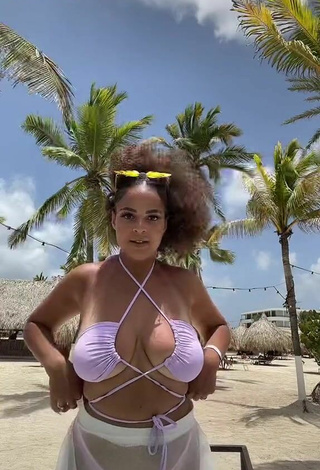 4. Luscious peachy.mely Shows Cleavage in Purple Bikini at the Beach (Underboob)