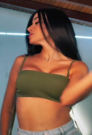 Erotic Poleth Villalba Shows Cleavage in Olive Crop Top