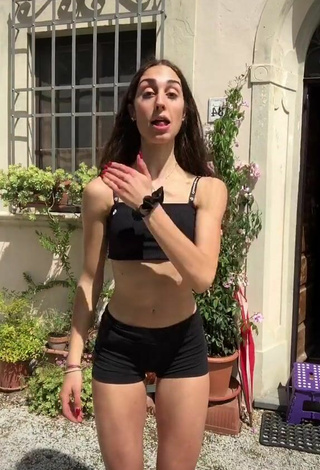 3. Luscious Rebecca Orsolini in Black Crop Top