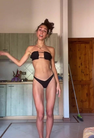 6. Titillating Rebecca Orsolini in Black Bikini