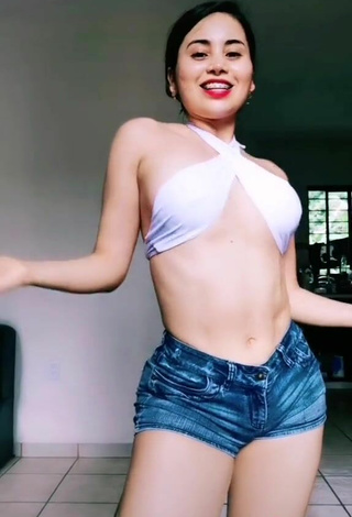 3. Titillating Selena Corzo in White Crop Top