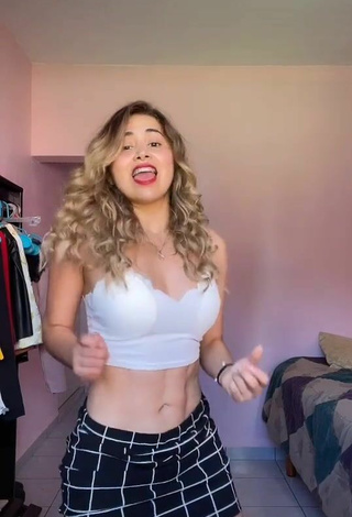 2. Luscious Selena Corzo in White Crop Top