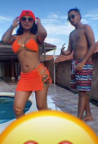 4. Titillating Anyuri Lozano Shows Cleavage in Electric Orange Bikini Top at the Pool (Underboob)