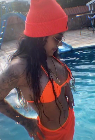 Sultry Anyuri Lozano Shows Cleavage in Electric Orange Bikini Top at the Swimming Pool (Underboob)